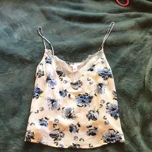 white tank top with blue and black flowers